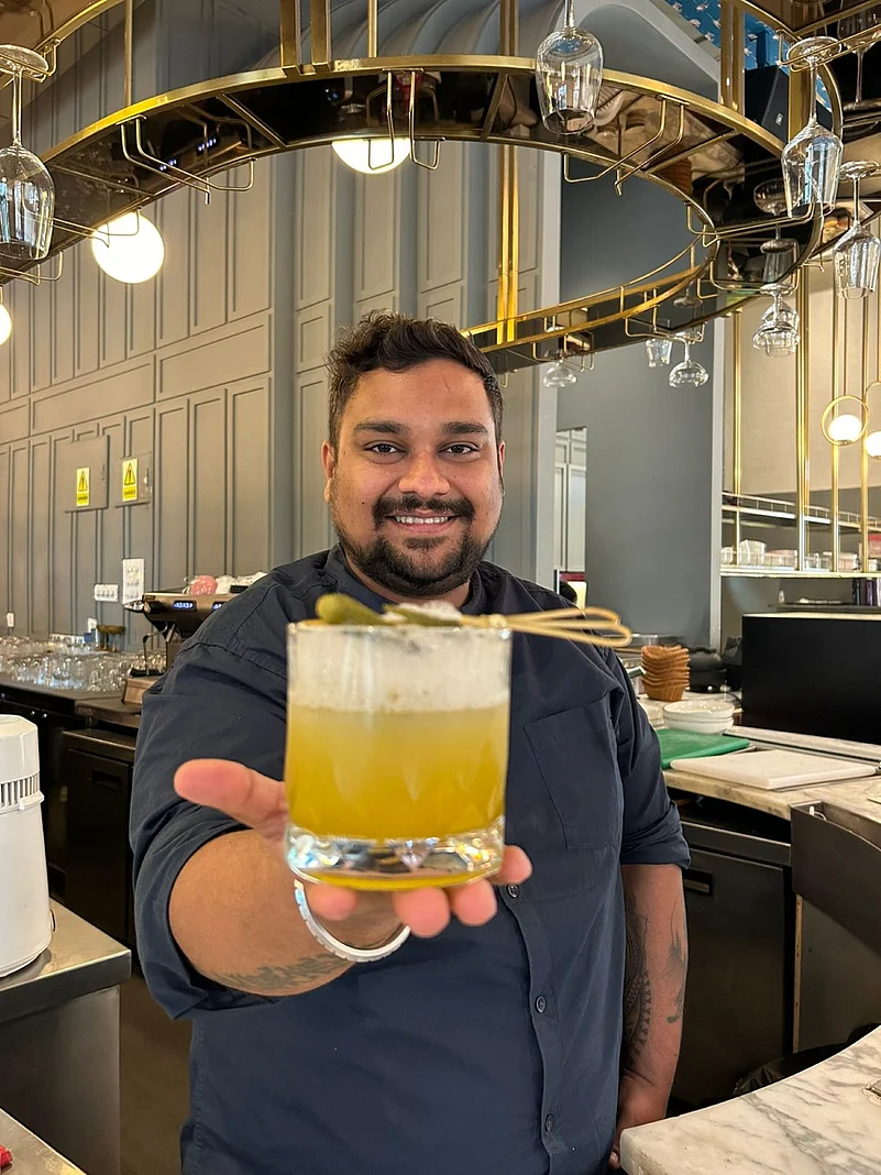 Head mixologist Vishal with one of his creations